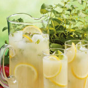 pitcher glasses of lemonade